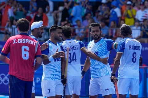 Harmanpreet Singh celebrates after scoring his side's second goal against Spain